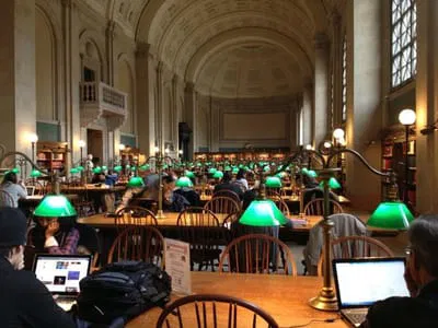 Image representing a bright, modern library interior with public spaces.